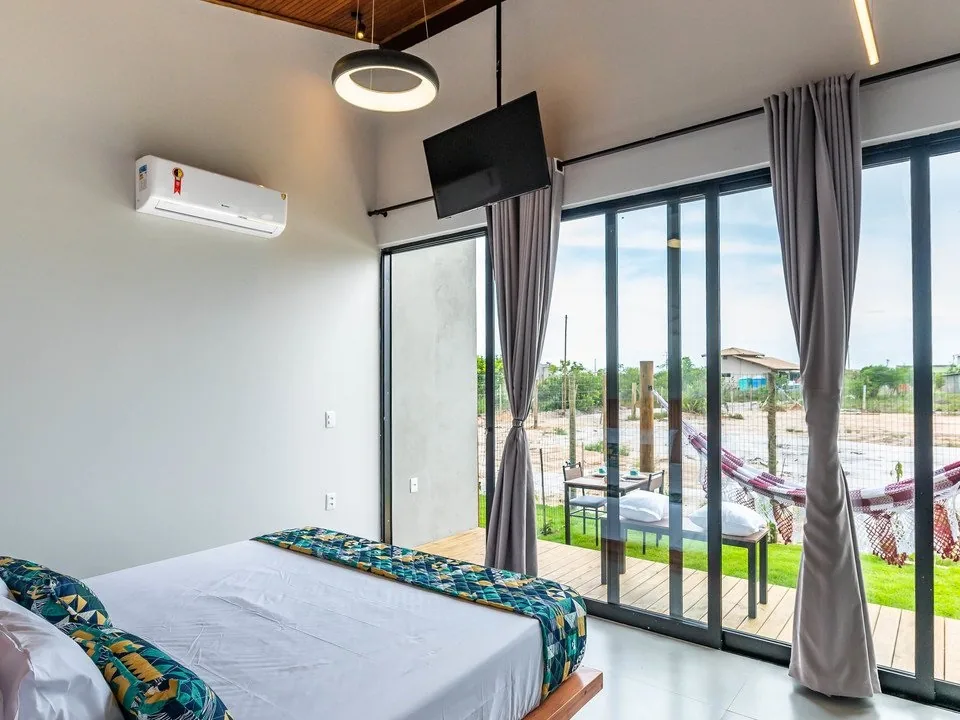 Quarto com vista para o jardim da Vila Gema